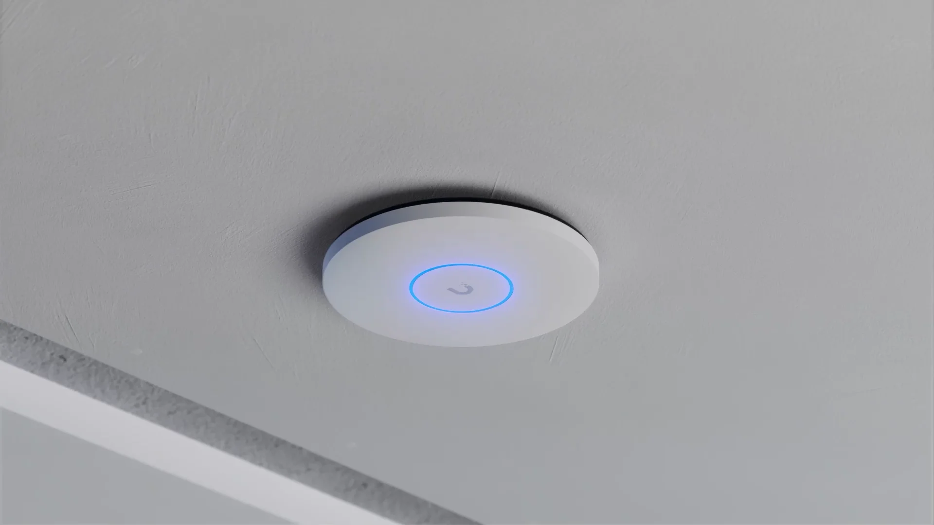 PoE-powered ceiling access point.